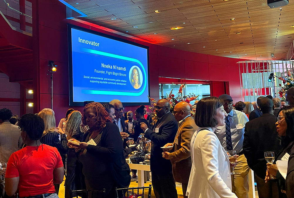 The Moonshot reception with a presentation presentated on the wall.